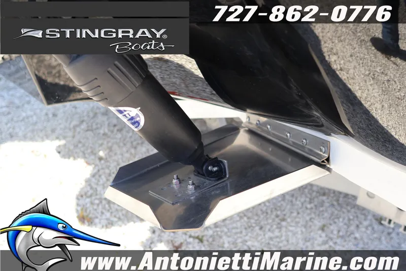 Slide: The Image of 2026 Stingray 216 CC boat detail with logo and contact information. - 10