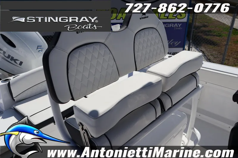 Slide: The Image of 2026 Stingray 216 CC boat seating with logo and contact details. - 19