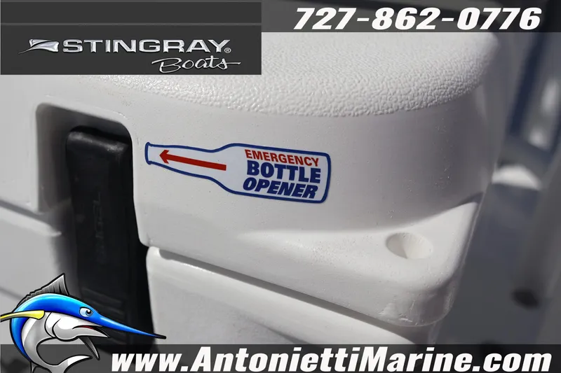 Slide: The Image of 2026 Stingray 216 CC boat detail with emergency bottle opener sticker, Antonietti Marine branding. - 25