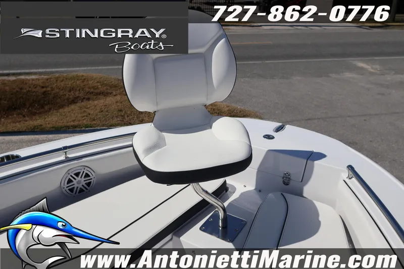 Slide: The Image of 2026 Stingray 216 CC boat with white seating, showcased by Antonietti Marine. - 29