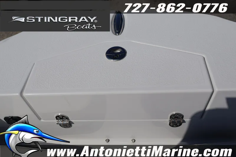 Slide: The Image of 2026 Stingray 216 CC boat deck with logo and contact details. - 30