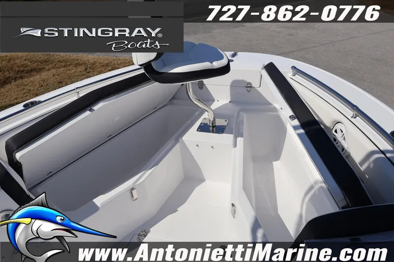 Slide: The Image of 2026 Stingray 216 CC boat interior with seating, showcased by Antonietti Marine. - 32