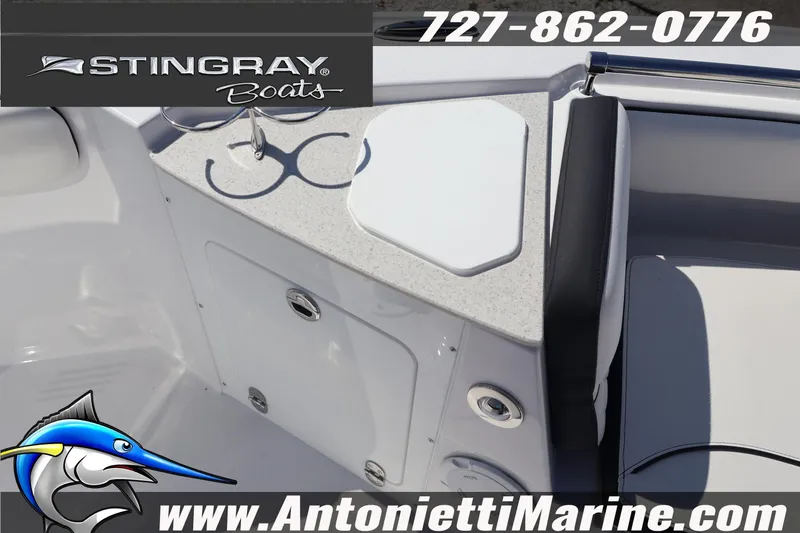 Slide: The Image of 2026 Stingray 216 CC boat interior with seating and storage, Antonietti Marine branding. - 33