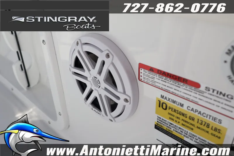 Slide: The Image of 2026 Stingray 216 CC boat speaker and capacity warning label. - 36