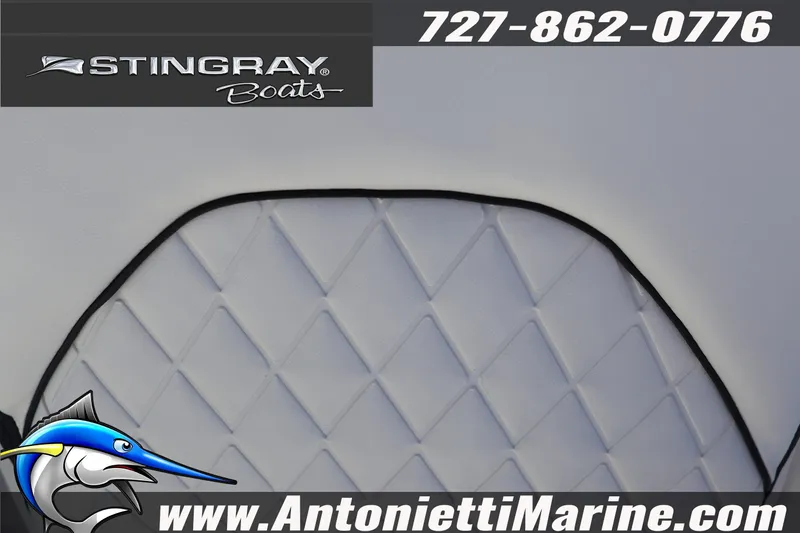 Slide: The Image of 2026 Stingray 216 CC boat seat with logo and contact details. - 40
