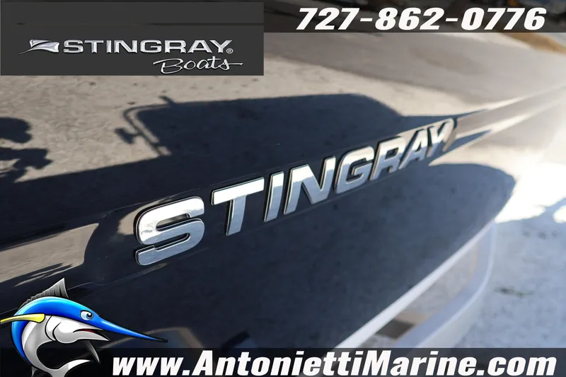 Slide: The Image of Stingray 216 CC 2026 boat logo with contact details and website. - 7
