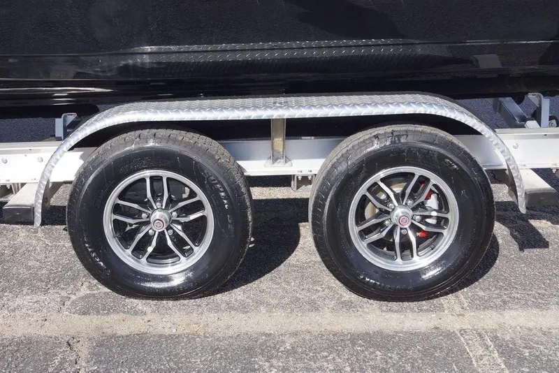 Slide: The Image of Tidewater 220 LXF 2026 boat trailer with dual wheels. - 3