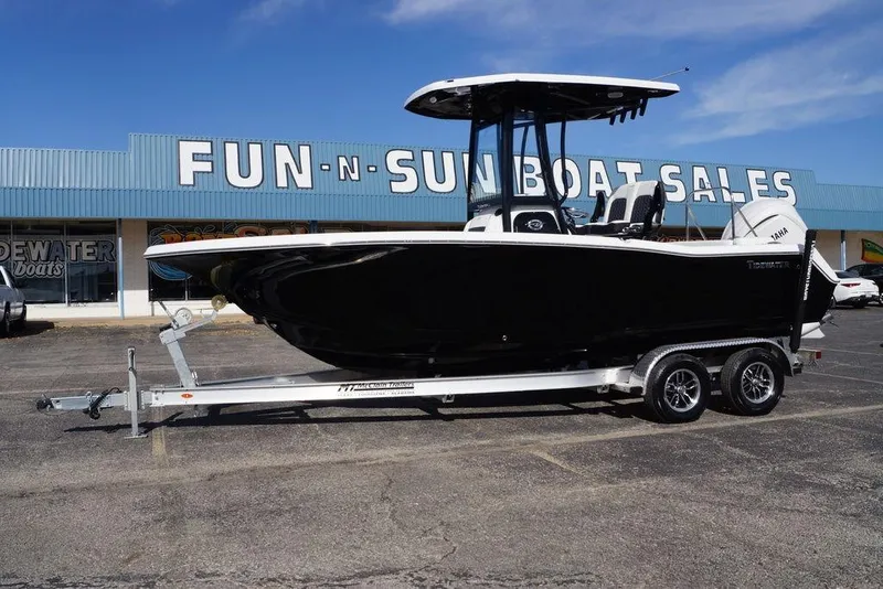 Slide: The Image of 2026 Tidewater 220 LXF boat on trailer at boat dealership. - 5