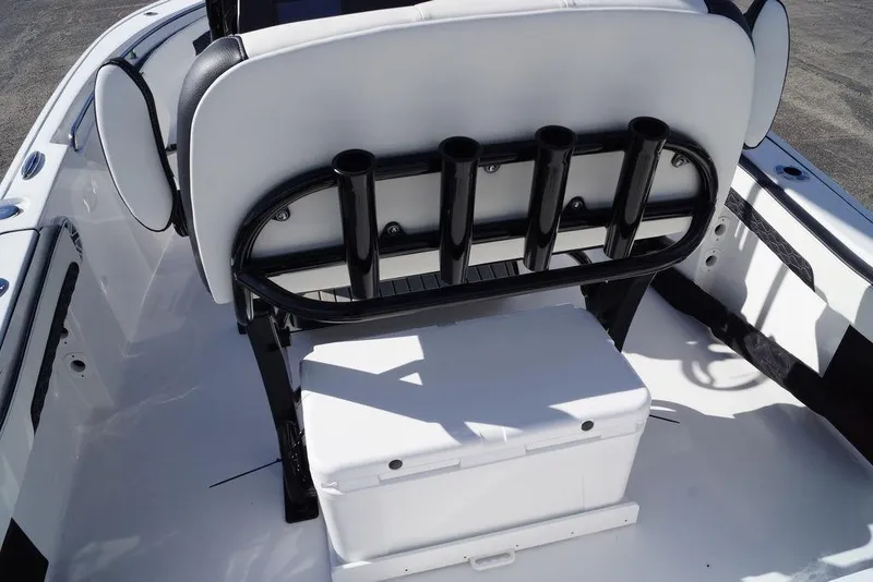 Slide: The Image of Tidewater 220 LXF 2026 boat with rod holders and storage. - 7
