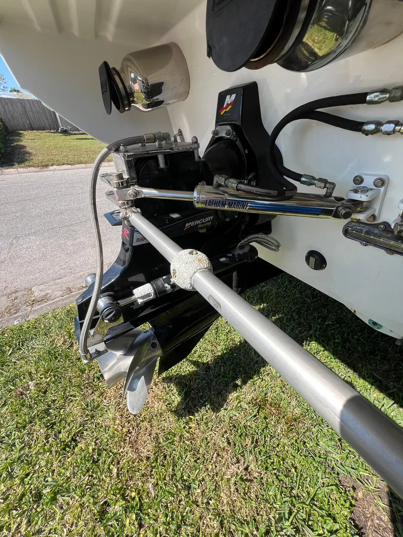 Slide: The Image of Close-up of 2016 Formula 353 FASTech boat engine components on grass. - 17