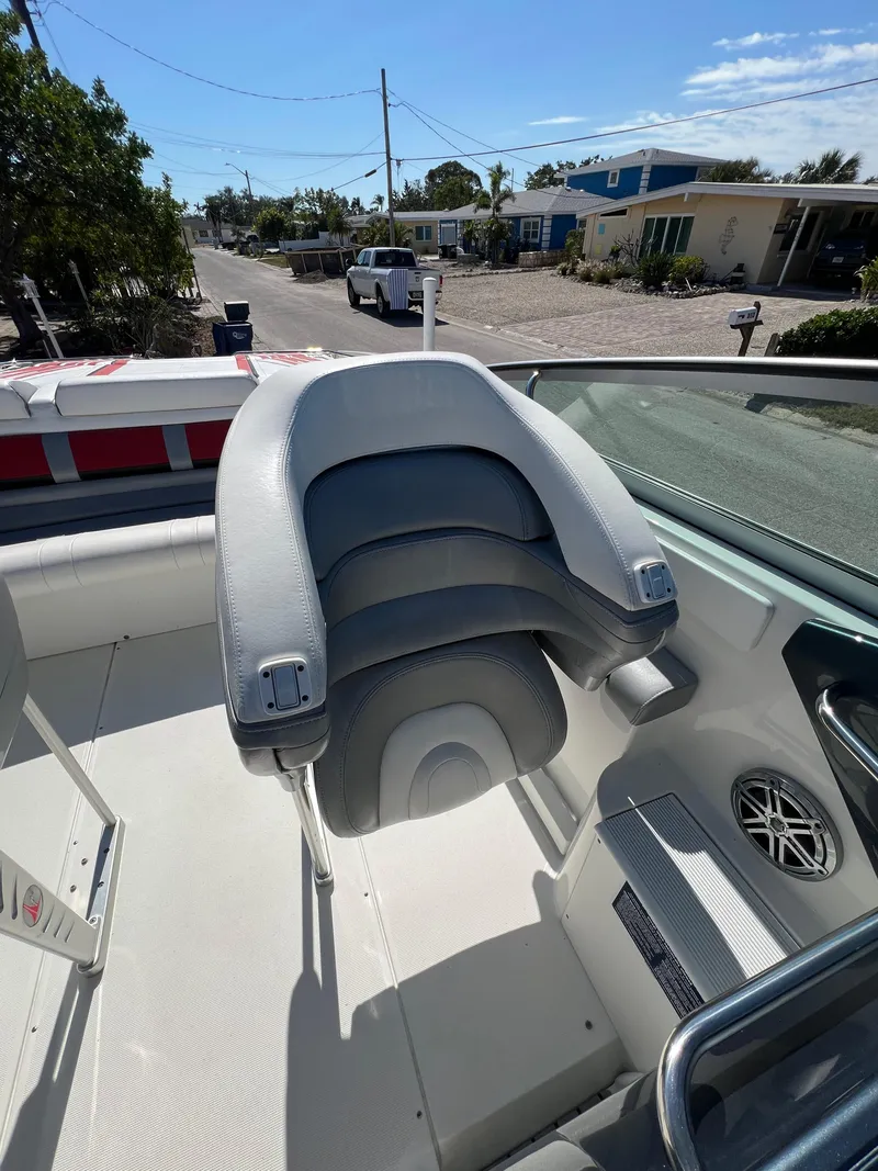 Slide: The Image of 2016 Formula 353 FASTech boat interior with gray seating and speaker. - 21