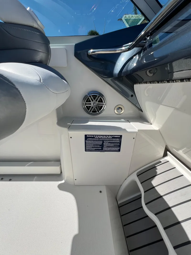 Slide: The Image of 2016 Formula 353 FASTech boat interior with speaker and seating detail. - 25