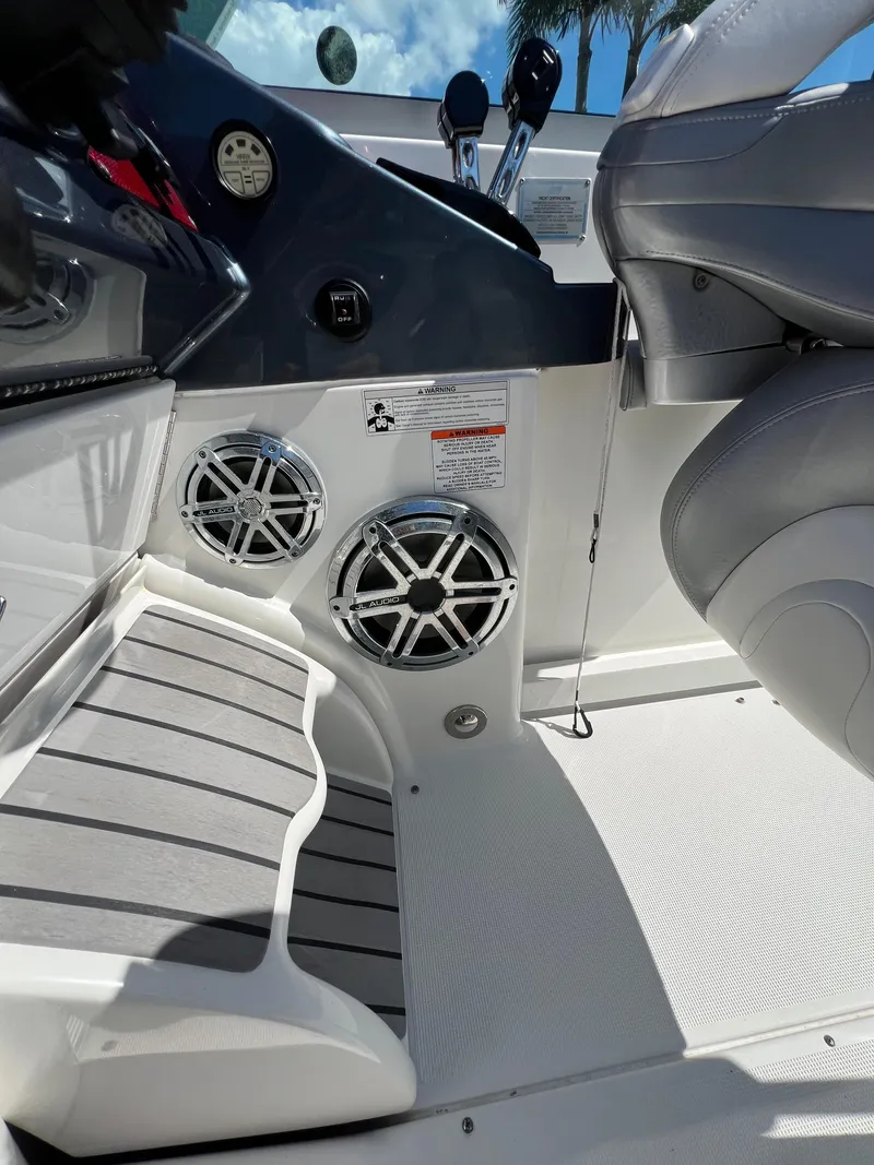 Slide: The Image of Interior of a 2016 Formula 353 FASTech boat, featuring sleek design and modern controls. - 26