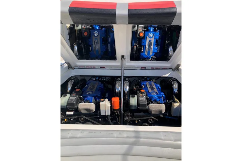 Slide: The Image of 2016 Formula 353 FASTech boat engine compartment with twin blue engines. - 29