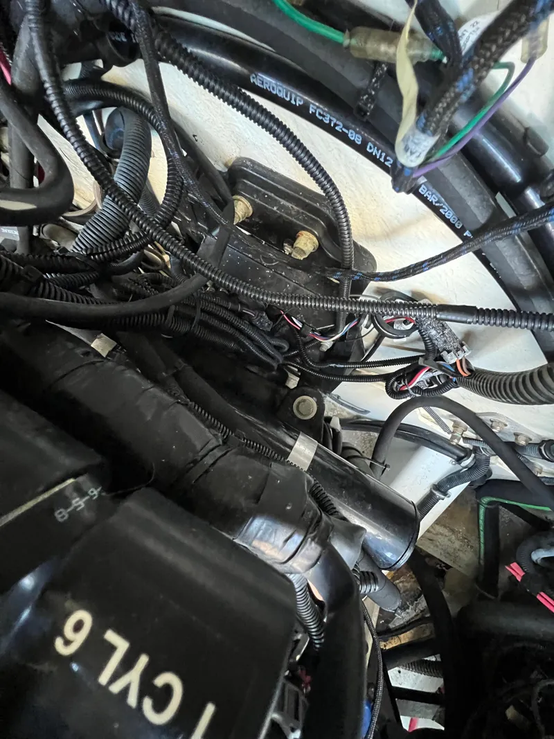 Slide: The Image of Engine compartment of a 2016 Formula 353 FASTech boat, showcasing wiring and components. - 34