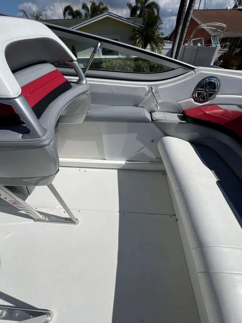 Slide: The Image of 2016 Formula 353 FASTech boat interior with white and red seating, modern design. - 36
