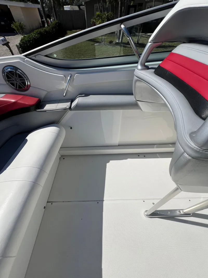 Slide: The Image of 2016 Formula 353 FASTech boat interior with white and red seating. - 38