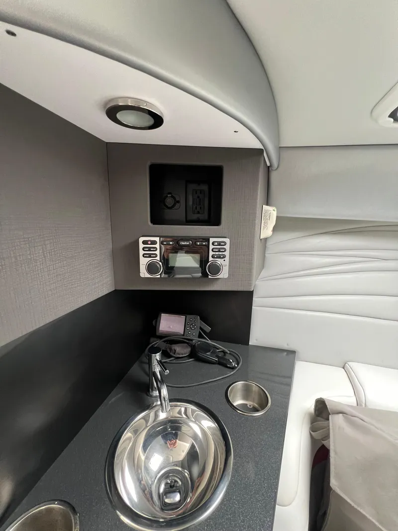 Slide: The Image of Interior of 2016 Formula 353 FASTech with sink and control console. - 51