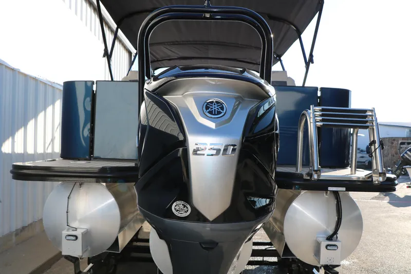 Slide: The Image of 2023 Silver Wave 2410 SW5 RLP pontoon boat with Yamaha 250 engine, rear view. - 10