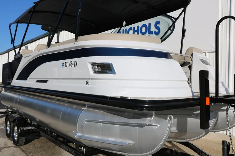 Slide: The Image of 2023 Silver Wave 2410 SW5 RLP pontoon boat on trailer, side view. - 13
