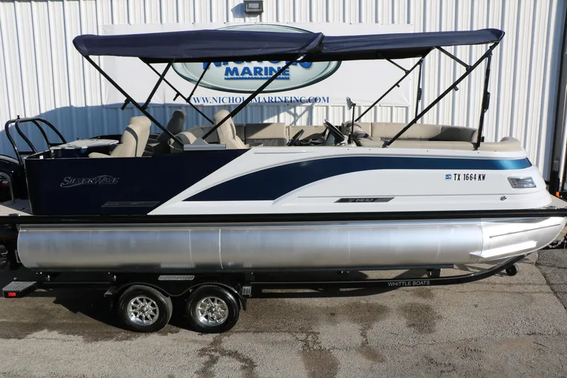 Slide: The Image of 2023 Silver Wave 2410 SW5 RLP pontoon boat with canopy on trailer. - 17
