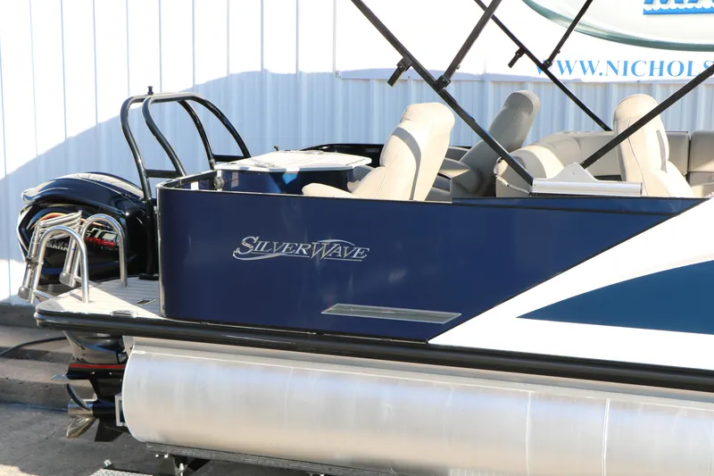 Slide: The Image of 2023 Silver Wave 2410 SW5 RLP pontoon boat with sleek design and comfortable seating. - 18