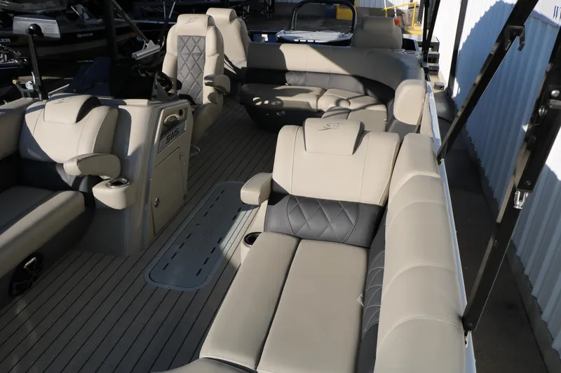 Slide: The Image of 2023 Silver Wave 2410 SW5 RLP boat interior with luxurious seating and modern design. - 23