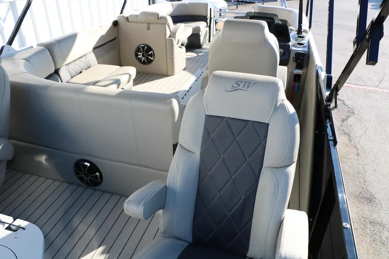 Slide: The Image of 2023 Silver Wave 2410 SW5 RLP boat interior with luxurious seating and modern design. - 29