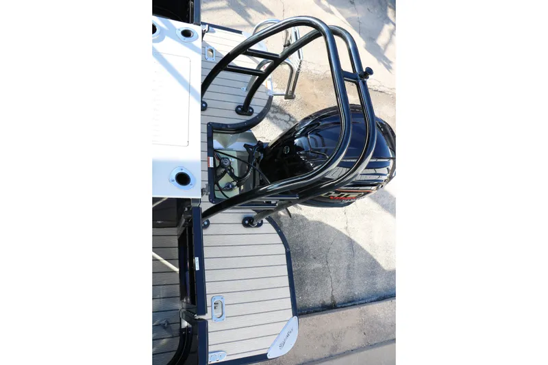 Slide: The Image of 2023 Silver Wave 2410 SW5 RLP boat with sleek motor and deck design. - 30