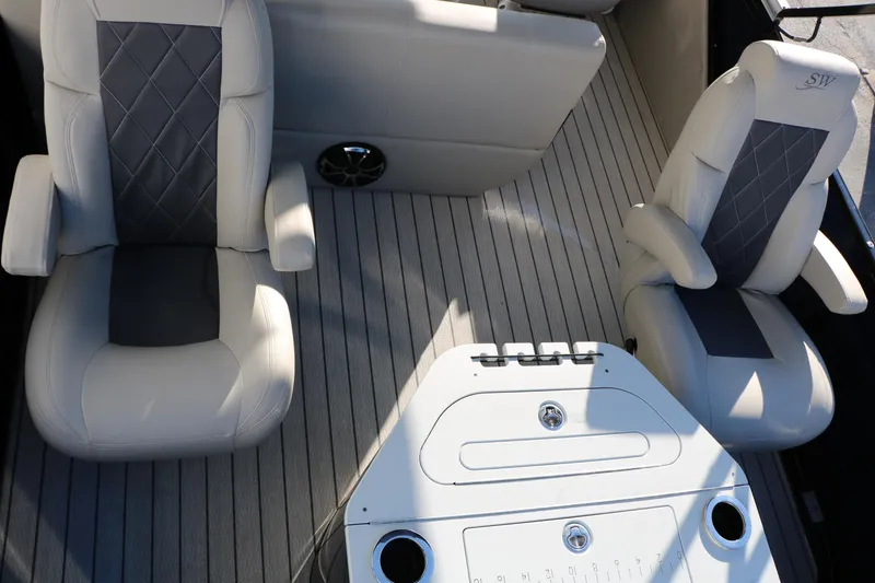 Slide: The Image of 2023 Silver Wave 2410 SW5 RLP boat interior with luxury seating and sleek design. - 32