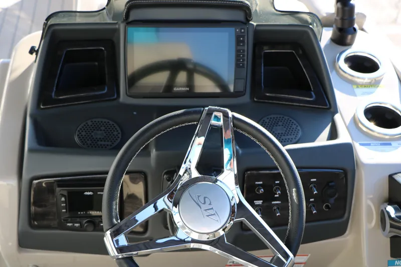 Slide: The Image of Steering console of 2023 Silver Wave 2410 SW5 RLP boat with modern controls and display. - 36