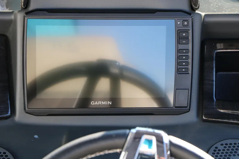 Slide: The Image of Garmin display on 2023 Silver Wave 2410 SW5 RLP boat dashboard. - 37