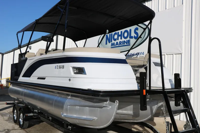 Slide: The Image of 2023 Silver Wave 2410 SW5 RLP pontoon boat at Nichols Marine dealership. - 4