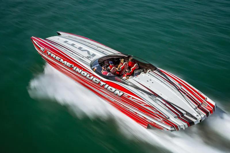 The Image of High-speed MTI 48 powerboat with red and white design on open water, 2019 model. - 0