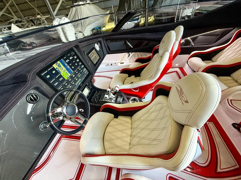 Slide: The Image of Luxurious 2019 MTI 48 boat interior with leather seats and advanced navigation system. - 34