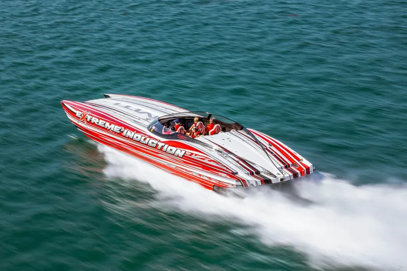 Slide: The Image of High-speed MTI 48 powerboat racing on water, featuring bold red and white design. - 4