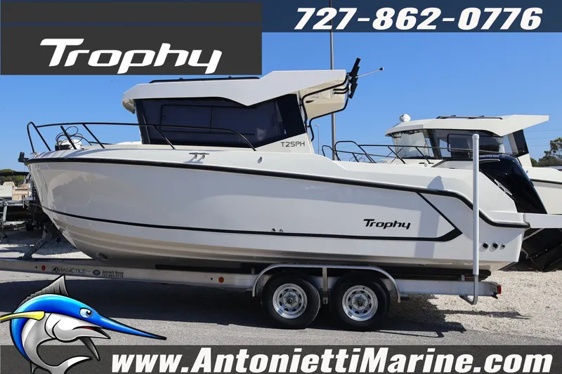 The Image of 2026 Bayliner Trophy T25 Pilothouse boat on trailer at Antonietti Marine. - 1