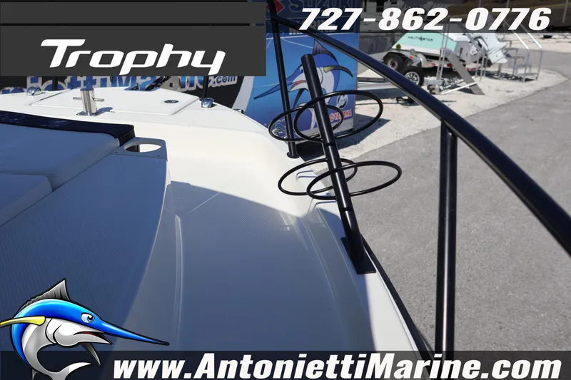 Slide: The Image of Bayliner Trophy T25 Pilothouse 2026 boat deck with fishing rod holders, displayed at Antonietti Marine. - 19