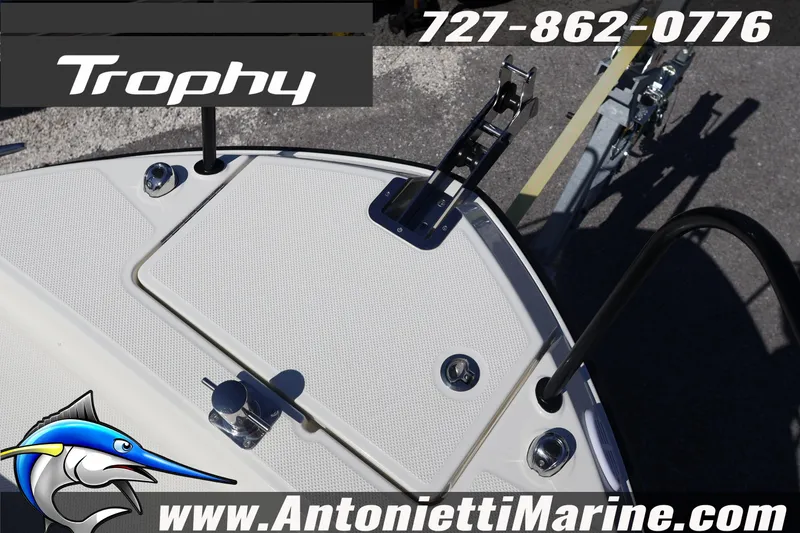 Slide: The Image of 2026 Bayliner Trophy T25 Pilothouse boat deck with contact details and logo. - 20