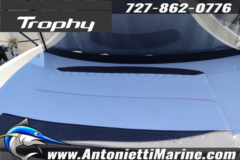 Slide: The Image of 2026 Bayliner Trophy T25 Pilothouse boat deck with logo and contact details. - 22