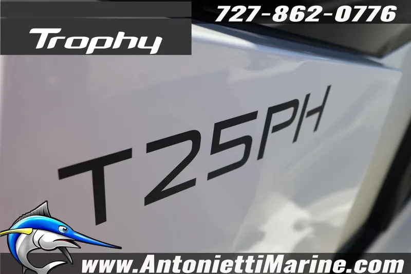 Slide: The Image of 2026 Bayliner Trophy T25 Pilothouse boat branding with contact details and website. - 24