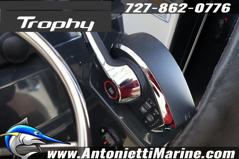 Slide: The Image of Close-up of 2026 Bayliner Trophy T25 Pilothouse steering and controls. - 30