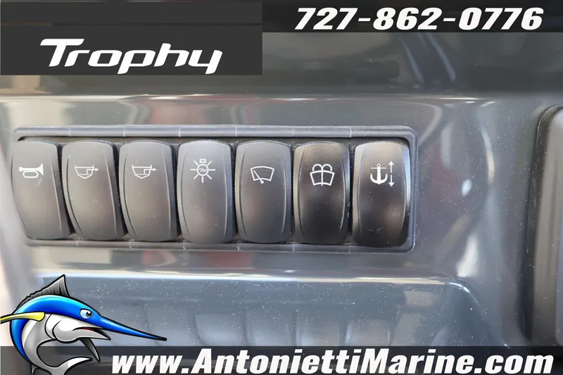 Slide: The Image of Control panel of 2026 Bayliner Trophy T25 Pilothouse with various function buttons. - 31