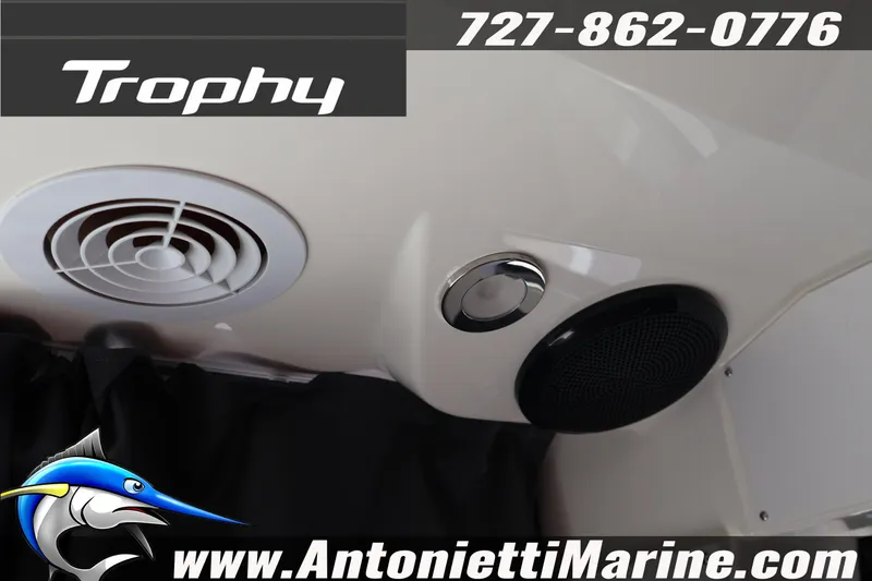 Slide: The Image of Interior view of 2026 Bayliner Trophy T25 Pilothouse with speaker and vent details. - 41
