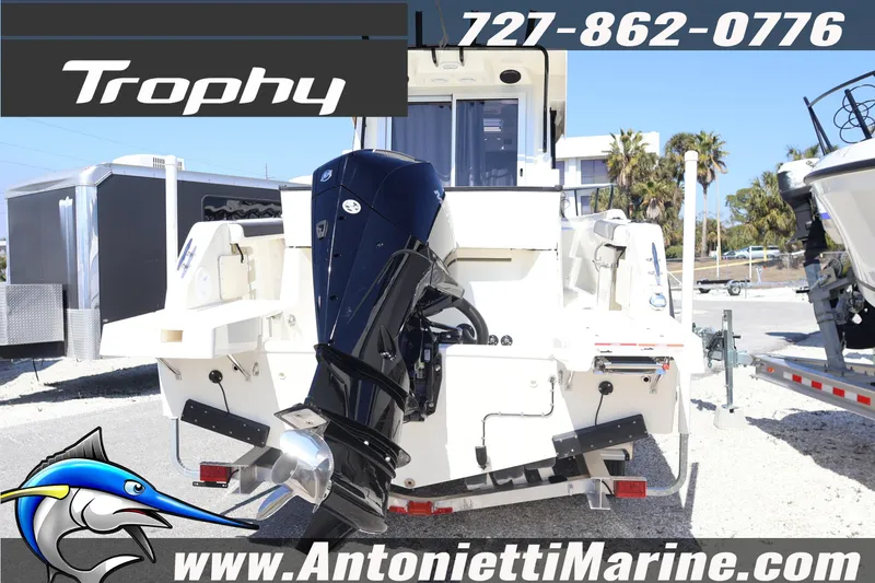 Slide: The Image of 2026 Bayliner Trophy T25 Pilothouse boat with outboard motor, displayed at Antonietti Marine. - 5