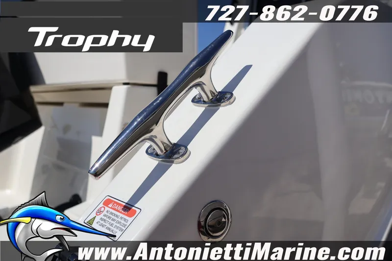 Slide: The Image of 2026 Bayliner Trophy T25 Pilothouse boat cleat with contact details and logo. - 8