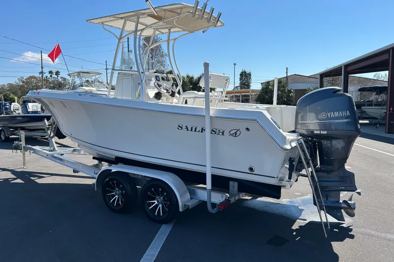 Slide: The Image of 2015 Sailfish 220 CC boat on trailer with Yamaha outboard motor. - 4