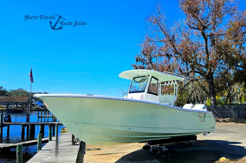 The Image of Sea Hunt Ultra 285 SE 2026 on boat ramp at North Florida Yacht Sales. - 0