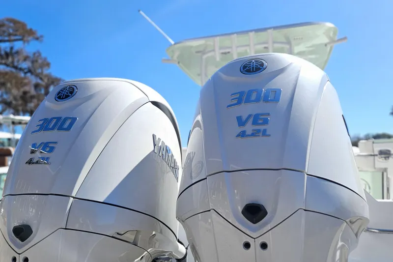Slide: The Image of Twin Yamaha 300 V6 outboard engines on a 2026 Sea Hunt Ultra 285 SE boat. - 4