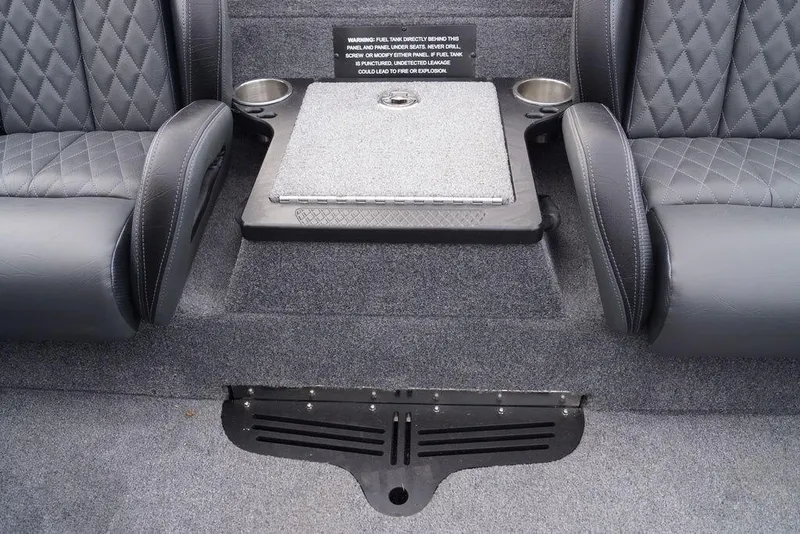 Slide: The Image of Interior of 2026 Phoenix 721 ZXL boat with cushioned seats and storage compartment. - 21